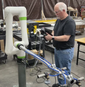 McNeil and Cobot w Techreo end of arm tooling